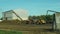 OLOMOUC, CZECH REPUBLIC, SEPTEMBER 10, 2019: Tractor trailer spreading fertilizer slurry field farming, dump dunghill of
