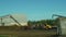OLOMOUC, CZECH REPUBLIC, SEPTEMBER 10, 2019: Tractor trailer spreading fertilizer slurry field farming, dump dunghill of