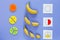 Ð¡olorful math fractions and bananas as a sample on violet background. Interesting math for kids. Education