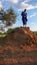 Olpopongi, Kilimanjaro Province / Tanzania: 29. December 2015: young Tanzania Masai warrior in traditional clothing digs in a