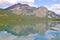 Olson Mountain reflecting on Upper Waterton Lake at Glacier National Park