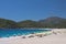 Oludeniz, Turkey - July 10, 2012: tourists spending their summer holidays enjoying swimming and sunbathing on wonderful beach on t
