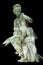 Olympic goddess of love Aphrodite Venus with Cupid sitting on swan. Ancient statue