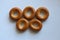 Olympic rings from bagels. Five bagels. Bagels isolated on white background. Sweet bakery snack.