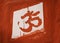 Om sign painted on wall of Hindu temple