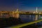 Omaha Nebraska downtown skyline at dusk. Bob Kerrey foot bridge over Missouri river.