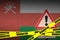 Oman flag and Covid-19 quarantine yellow tape. Coronavirus or 2019-nCov virus