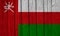 Oman Flag Over Wood Planks