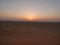 Oman, Salalah, seen from above by a sand dune in the deserted camp at sunset