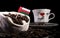 Omani flag in a bag with coffee beans on black