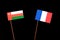 Omani flag with French flag on black