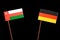 Omani flag with German flag on black