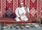 Omani man selling traditional khanjar daggers