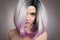 Ombre bob hairstyle blonde girl portrait. Purple makeup. Beautiful hair coloring woman. Fashion Trendy haircut. Blond model with