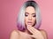 Ombre bob short hairstyle and manicured nails. Beauty makeup. Beautiful hair coloring woman with wow face holding hand near her