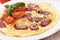 Omelet with pepperoni sausage and cherry tomato