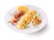 Omelet roll with cheese and ham slices on plate