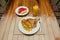 Omelet with vegetables, bread toast and fresh Juice on white a plate