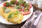 Omelette fried eggs with vegetables