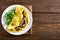 Omelette with mushrooms, chicken meat, greens
