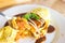 Omelette rice omurice in spoon with white dish japanese food