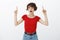 Omg just look. Stunned amazed wondered attractive woman short haircut summer red t-shirt drop jaw astonished surprised