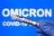 Omicron COVID-19 variant and coronavirus PCR test kit, focus on test tube