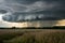 Ominous storm cloud brings danger over rural meadow