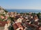 Omis, Croatia - July 23, 2021: Panorama of the old town of Omis with the historic Church of St. Michael in the center.