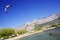 OMIS, CROATIA, SEPTEMBER 18, 2020 - Tourists enjoying kitesurfing during a windy sunny day in Omis Resort, Croatia.