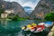 Omis fishing harbor with boats and high mountains, Dalmatia, Croatia