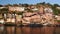 Omkareshwar cityscape, India, sacred hindu temple. Holy Narmada River, boats floating