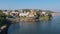 Omkareshwar cityscape, India, sacred hindu temple. Holy Narmada River, boats floating. Travel destination for tourists and pilgrim