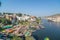 Omkareshwar cityscape, India, sacred hindu temple. Holy Narmada River, boats floating. Travel destination for tourists and pilgrim