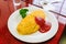 Omurice, omelette rice with ketchup sauce.