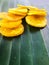 Onam special fried banana chips placed on a banana leaf.