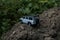 Ð¡oncept travel and racing  for four wheel drive off road vehicle. 4v4 SUV makes its way across rough terrain Toy car