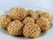 Onde onde, traditional snacks from Indonesia with a sweet taste and additional sesame topping on  background, close up.