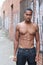 One amazing African man with muscular male sensual topless body with strong cool 6 pack abdominal and athletic chest