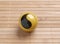 One baoding ball on bamboo background