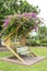 One of the beautiful bougainvillea-covered benches of Darwin`s Bicentennial Park, Australia