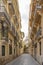 One of the beautiful side streets of Carrer dels Cavallers in Valencia, Spain