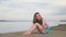 One beautiful teenage girl with brown hair outside on a beautiful summer day.