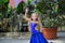 One beautiful young girl fits a modern dancer in a blue suit, a young dancer, dancing and jumping, Dance with a scarf. Young girl