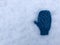 One blue knitted heart pattern baby child glove on snow background isolated