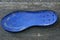 One blue old plastic sole shoe insole