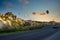 One car runs on the streets of the old town of Uchisar, a limestone mountain