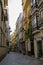 One of the charming, colorful, narrow street in Malaga, Spain