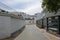 One of the charming, narrow street in Nerja, Spain