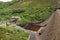 One of the dams in the summertime of the Elan valley of Wales.